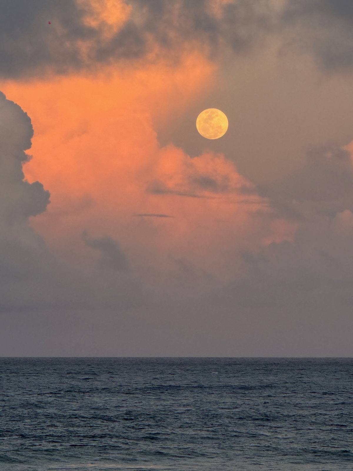 Full moon over ocean